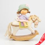 Маленькое фото 1: Сувенир «Девочка на лошадке» (полирезин), H19x17x7,5см, цв. в асс.