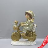 Маленькое фото 1: Сувенир «Маличик на велосипеде» (полирезин), H15x12x6см, золотой