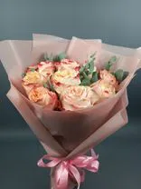 Фото флориста 1: Букет из 11 пионовидных роз Кахала