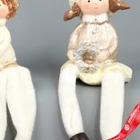 Маленькое фото 3: Сувенир «Мальчик/Девочка сидящий» (полирезин), Н9,5х6х5,5см, в асс., шампань