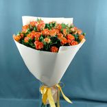 Фото флориста 1: Букет из 11 желто-красных роз в пленке