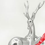 Маленькое фото 2: Сувенир «Олень лежащий» (полирезин), Н20,3х21х7,3см, серебряный