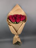 Фото флориста 1: Букет из 11 красных роз в крафте