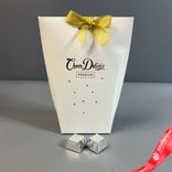 Маленькое фото 2: Набор конфет Choco Delicia в темном шоколаде «Пралине Миндаль», 220гр.. Сервис доставки цветов AzaliaNow