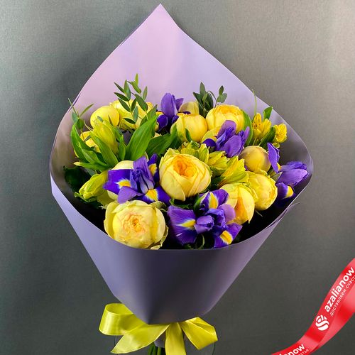 Фото 2: Букет из 9 пионовидных роз, 5 ирисов и 3 альстромерий в сиреневой пленке