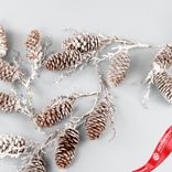 Маленькое фото 3: Гирлянда из шишек заснеженная, 105 см, коричневый